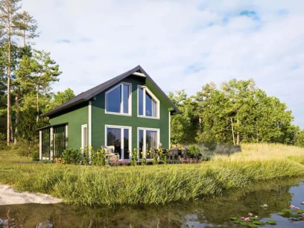 Drewniany domek letniskowy o powierzchni do 70m², otoczony zielenią, idealny na całoroczne wypady
