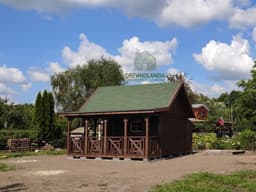 Mieszko I, ogrodowy domek drewniany z tarasem, Drewnolandia
