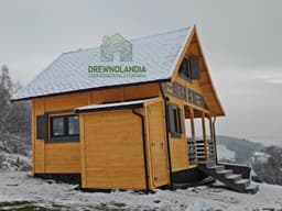 Drewniany domek z tarasem Mieszko II - domek letniskowy